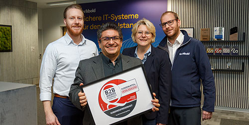  Von Katharina Harm|16.01.2025 techbold erhält den B2B-Award Österreich 2024/25 V.l.n.r.:Davor Kiseloski, Head of Service Delivery; Leopold Haselbauer, Inside Sales Manager; Evelyn Heinrich, Head of Core Business; Patrik Pittner, Head of Operations Team Wir haben riesigen Grund zur Freude: denn wir wurden in den Bereichen Kundenzufriedenheit und Service nicht nur einmal, sondern gleich ganze sechs Mal ausgezeichnet! Die Auszeichnung im Rahmen der unabhängigen Studie „B2B-Award Österreich 2024/25“ der Gesellschaft für Verbraucherstudien (ÖGVS) bestätigt unseren kontinuierlichen Einsatz für höchste Qualität und Kundenzufriedenheit. Außerdem unterstreicht diese Ehrung die Bestrebungen von techbold, in allen Bereichen eine herausragende Leistung zu bieten und auf die Wünsche unserer Kunden tagtäglich einzugehen. Was macht diese Auszeichnung so besonders? Die Ergebnisse der ÖGVS-Studie beruhen auf einer umfassenden Analyse: Über 115.000 Bewertungen von Entscheidungsträgern zu insgesamt 876 Unternehmen aus 88 Branchen wurden ausgewertet. Dass wir dabei gleich mehrfach hervorgehoben wurden, zeigt uns, dass unsere Arbeit geschätzt wird – und das in Bereichen, die für uns besonders wichtig sind: Herausragende Kundenzufriedenheit (branchenübergreifend) Herausragender Kundenservice (branchenübergreifend) Herausragendes Preis-Leistungs-Verhältnis (branchenübergreifend) Top-Kundenzufriedenheit in der Branche IT-Beratungen Top-Kundenservice in der Branche IT-Beratungen Top-Preis/Leistung in der Branche IT-Beratungen Besonders stolz sind wir darauf, dass wir als IT-Dienstleister in allen drei Kategorien – Kundenzufriedenheit, Kundenservice und Preis-Leistungs-Verhältnis – unter den Top 3 gelistet wurden. Ein Meilenstein, der inspiriert: Unser Versprechen für die Zukunft Die Auszeichnung ist für uns ein wichtiger Meilenstein – aber vor allem ein Versprechen für die Zukunft. Denn Kundenzufriedenheit steht bei techbold an oberster Stelle, und diese Priorität wird sich auch 2025 und darüber hinaus nicht ändern. Unsere Auszeichnungen zeigen, dass wir auf einem hohen Niveau arbeiten, und sie motivieren uns, noch besser zu werden. Wir wissen, dass die Branche der IT-Security anspruchsvoll ist und die Kundenerwartungen stetig steigen. Genau das treibt uns an: Wir wollen nicht nur mithalten, sondern neue Maßstäbe setzen. Getreu nach unserem Motto Better never stops. Ein herzliches Dankeschön Dieser Erfolg wäre ohne unser Team nicht möglich. Jeder Einzelne bei techbold trägt durch Engagement, Fachwissen und Innovationsgeist dazu bei, dass wir einen Schritt weiter gehen. Wir blicken mit stolz auf unser Team und können guten Gewissens sagen: ihr seid das beste Team, was techbold jemals hatte. Das Jahr 2025: Weiterhin im Zeichen der Kundenzufriedenheit Die Auszeichnung motiviert uns, unseren Weg konsequent fortzusetzen. Im kommenden Jahr werden wir weiterhin alles daransetzen, für Unternehmen des österreichischen Mittelstands der erste Ansprechpartner zu sein, wenn es um IT-Security und IT-Lösungen geht und dabei auch Kundenzufriedenheit in den Fokus stellen. Wir freuen uns auf ein spannendes Jahr 2025 und stehen schon in den Startlöchern, unser Bestes zu geben. Wir beantworten gerne alle Fragen. Kontaktiere uns über das untenstehende Formular oder auch unter +43 59 555 und office@techbold.at. Unsere vollständigen Adressdaten findest du hier Unternehmensname* Vorname* Nachname* E-Mail Adresse* Bitte um Rückruf Nachricht hinterlassen Datenschutzerklärung Evelyn Heinrich / Head of Account Management Evelyn Heinrich Head of Account Management oder ein Account Manager aus ihrem Team melden sich umgehend. 